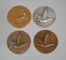Vier Medaillen Taubenzucht