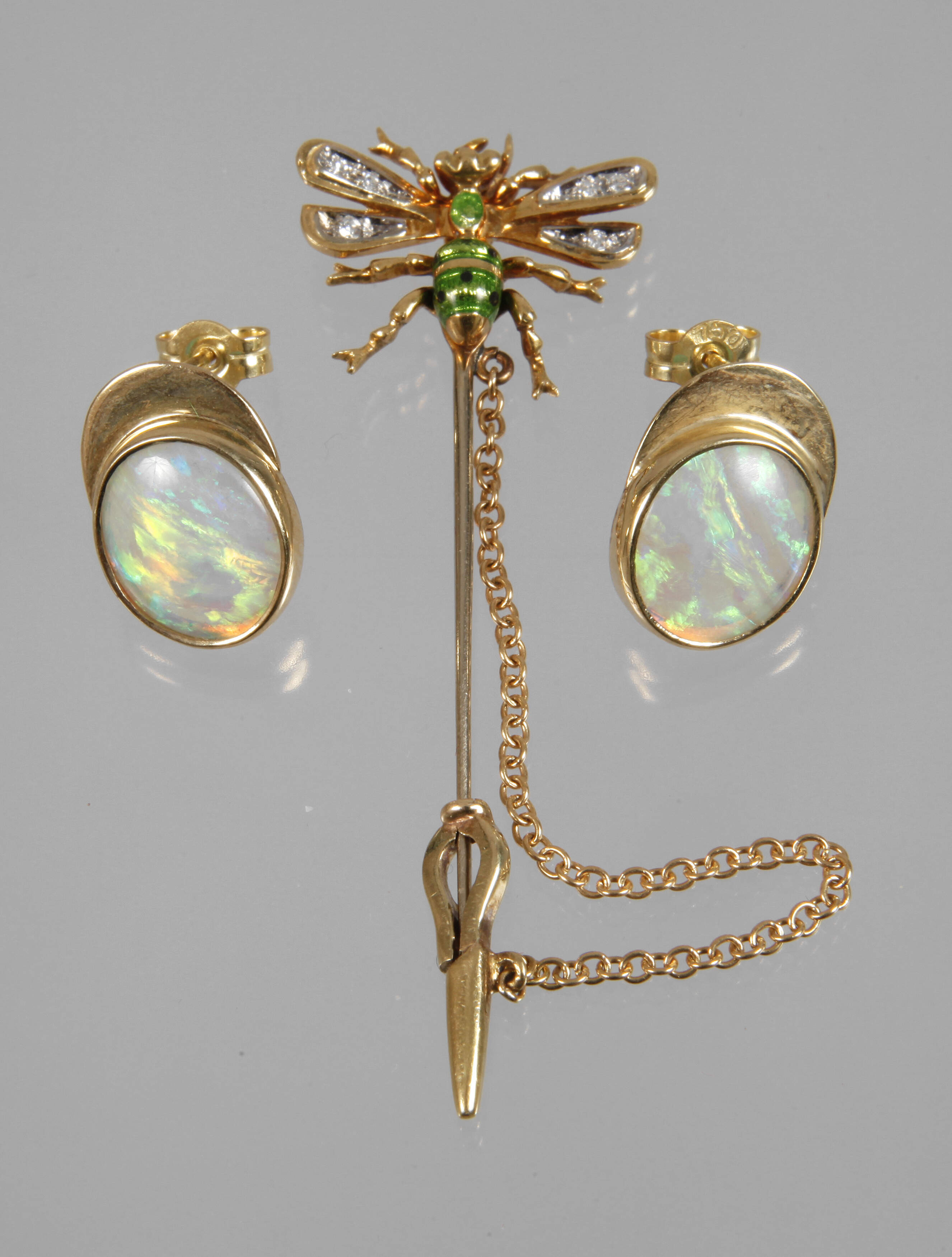 Paar Ohrstecker und Reversnadel