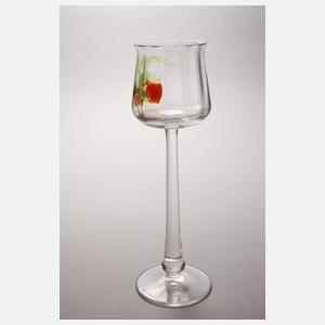 Vier Stängelgläser mit eingeschmolzenen Früchten