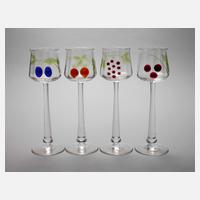 Vier Stängelgläser mit eingeschmolzenen Früchten111