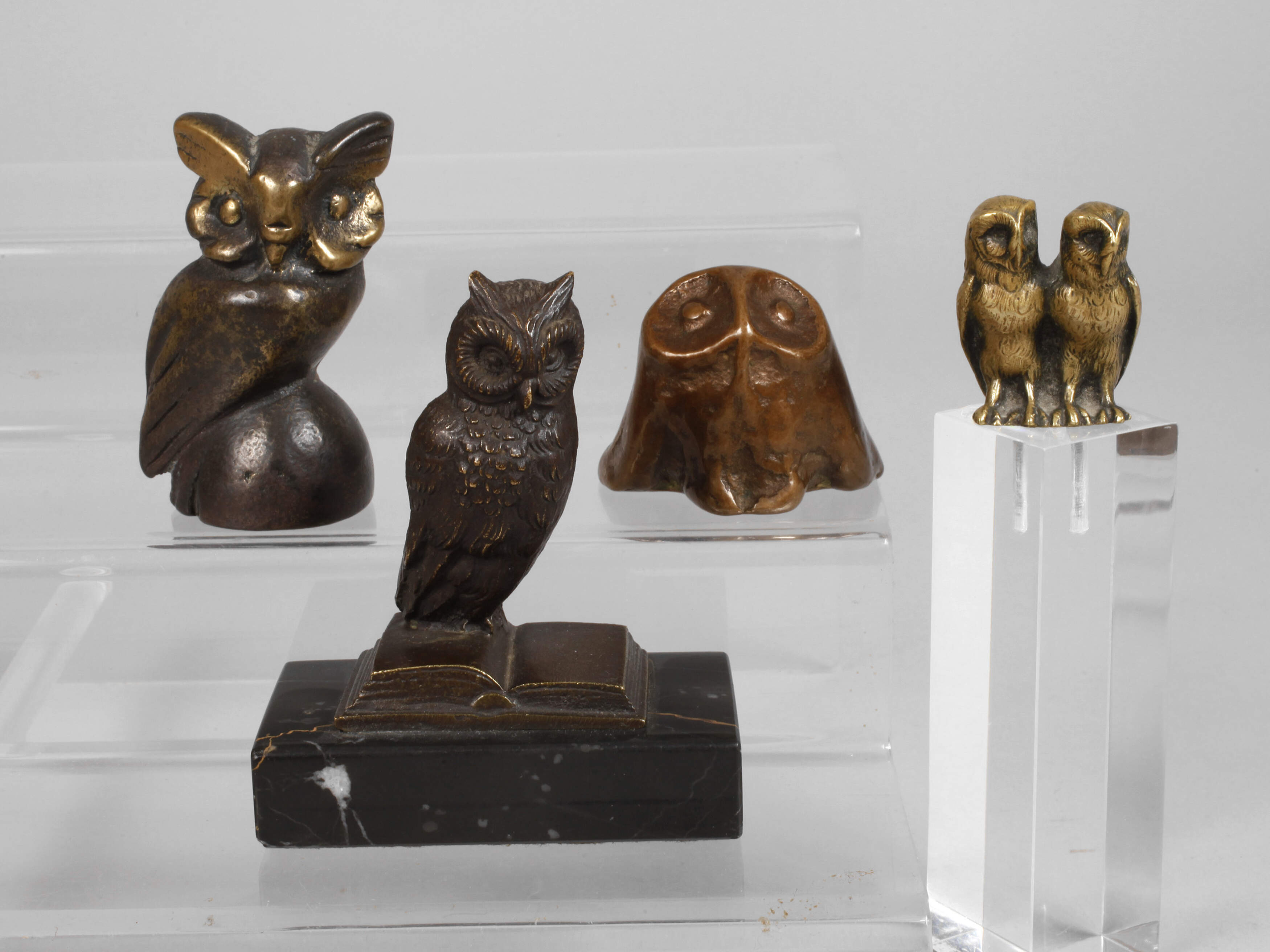 Vier kleine Eulen Bronze