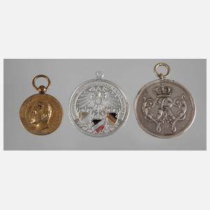 Drei Medaillen