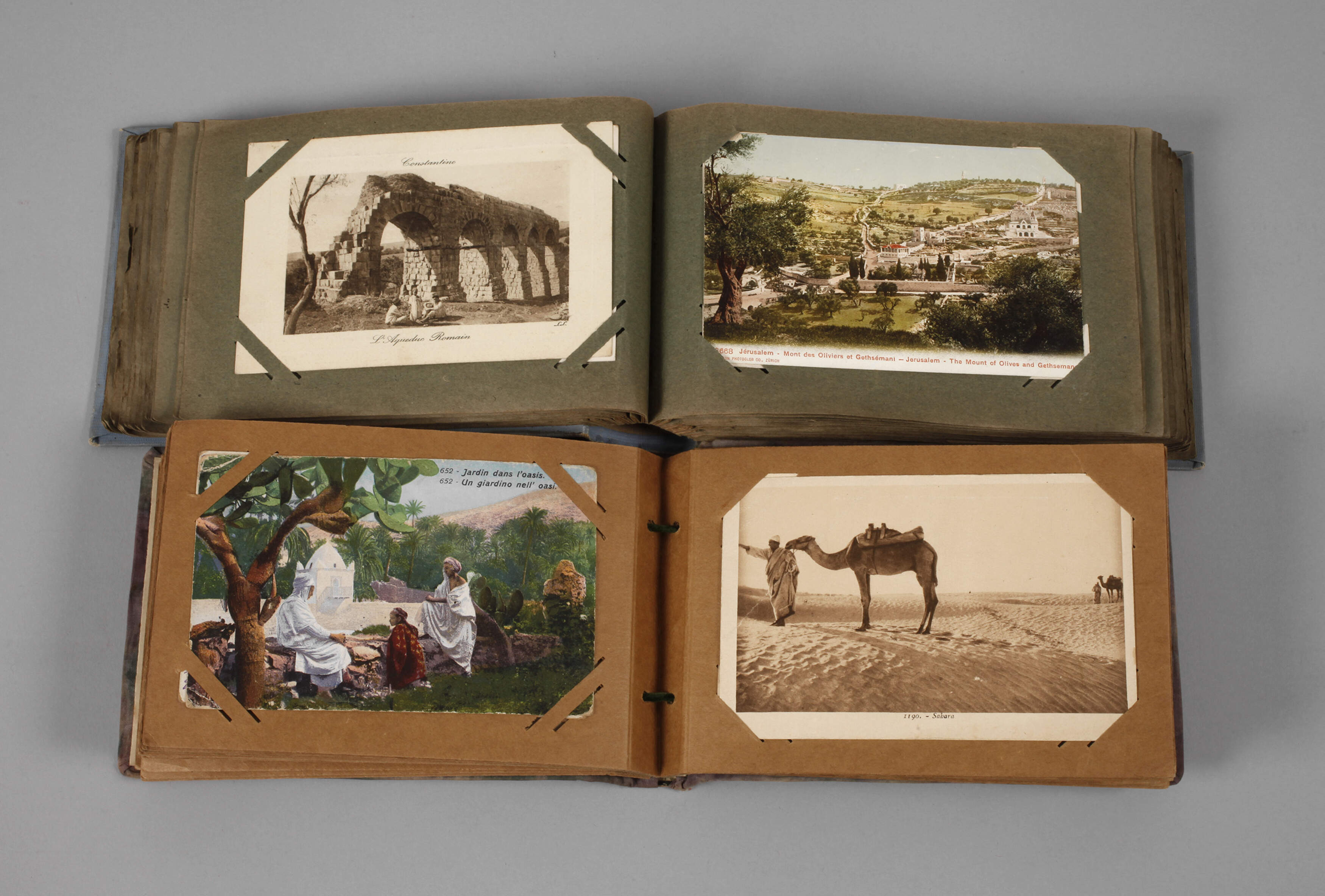 Zwei Ansichtskartenalben Asien und Afrika