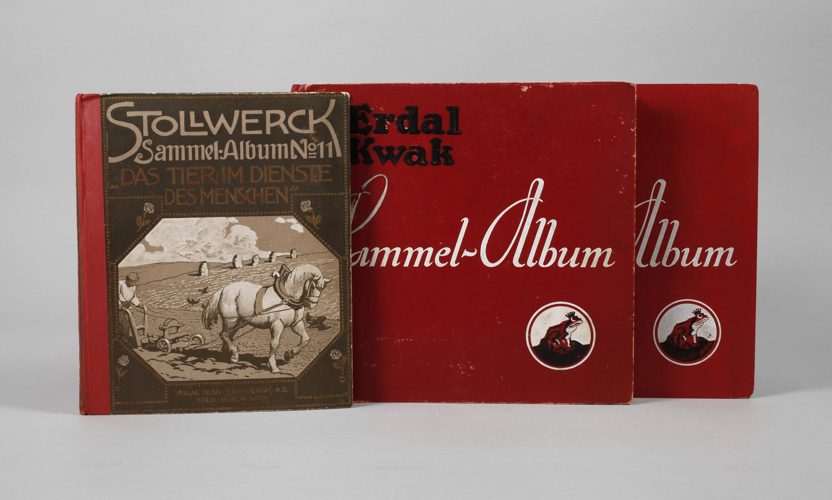 Drei Alben Kaufmannsbilder