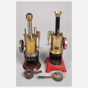 Vier kleine stehende Dampfmaschinen