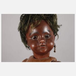 Zwei Porzellankopfpuppen als Afrikaner