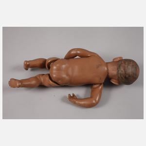 Zwei Porzellankopfpuppen als Afrikaner