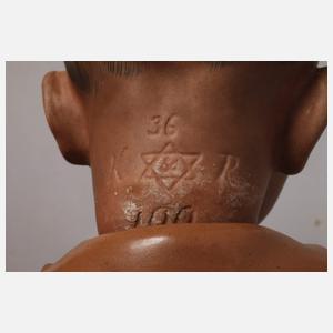 Zwei Porzellankopfpuppen als Afrikaner