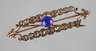 Goldbrosche mit Diamanten