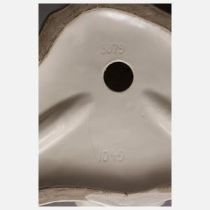 Hockender weiblicher Akt