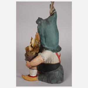 Gartenzwerg als Blumentopfhalter