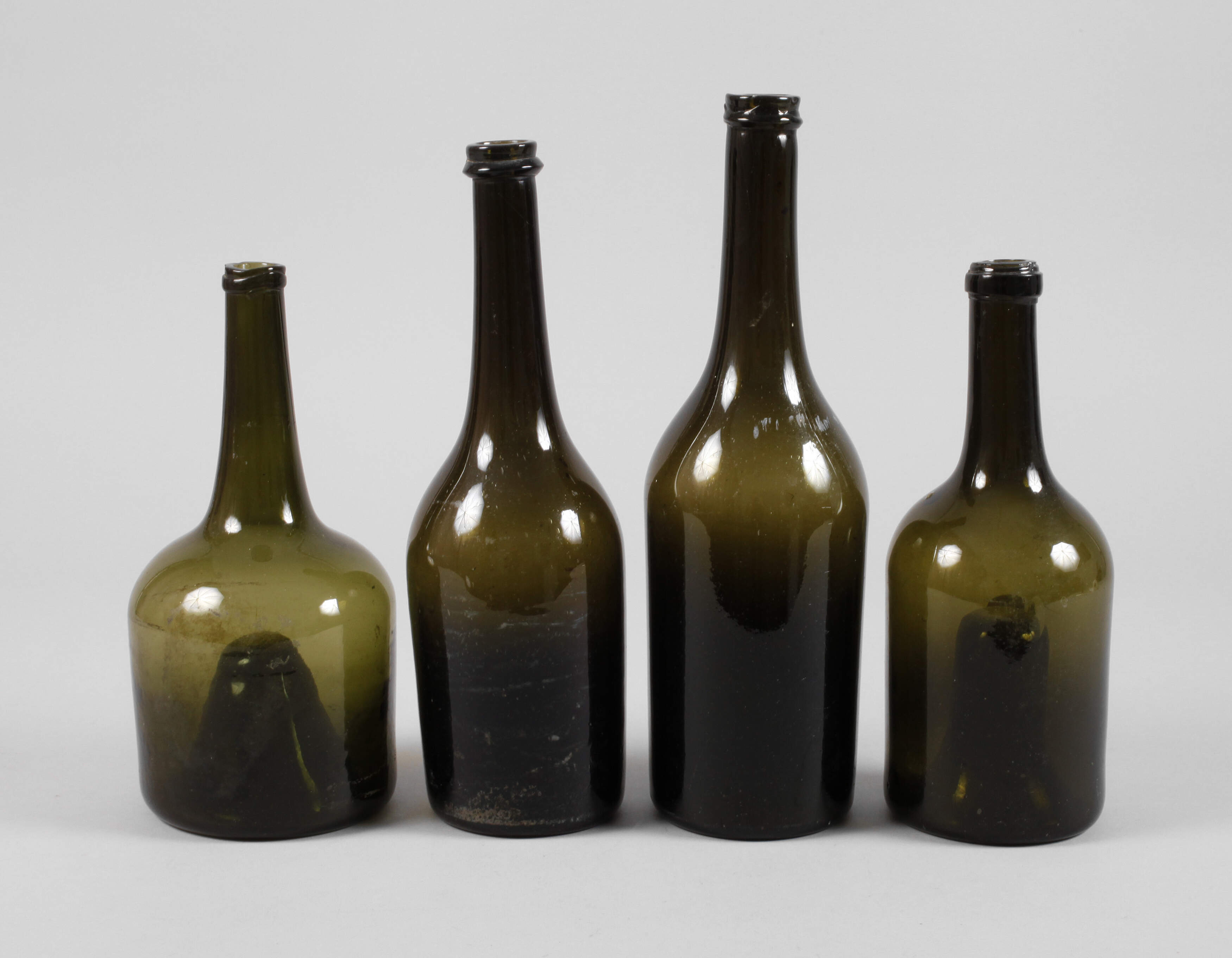 Vier Schlegelflaschen