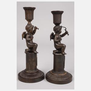 Paar Eisenguß-Leuchter mit Amoretten