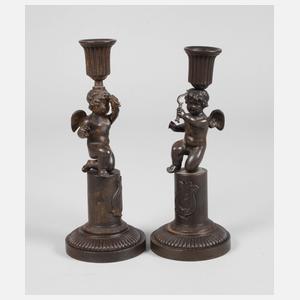 Paar Eisenguß-Leuchter mit Amoretten