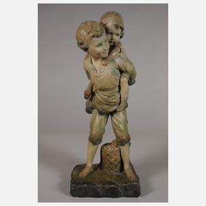 Kinderfigur Huckepack