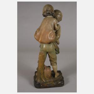 Kinderfigur Huckepack