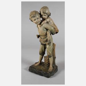 Kinderfigur Huckepack