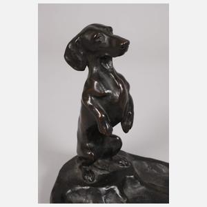 Drei kleine Dackelskulpturen