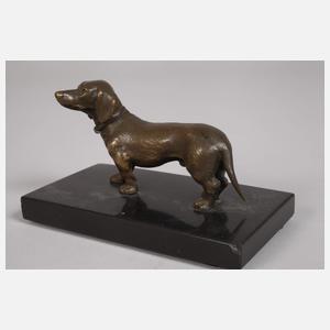 Drei kleine Dackelskulpturen