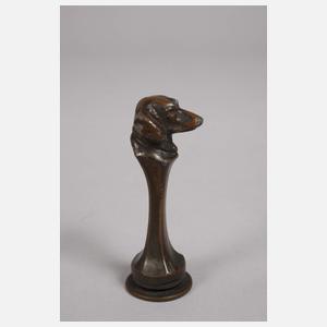 Drei kleine Dackelskulpturen