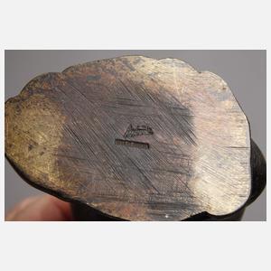 Carl Auböck, "leaning on treestump"