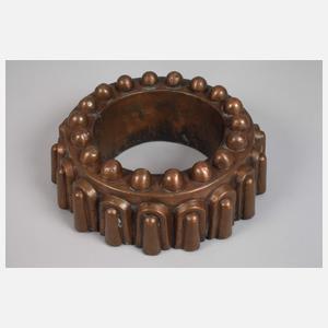 Drei Kupferbackformen