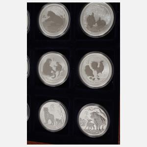Zwölf Silbermünzen Australien