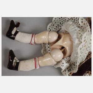 Kleine Wachskopfpuppe