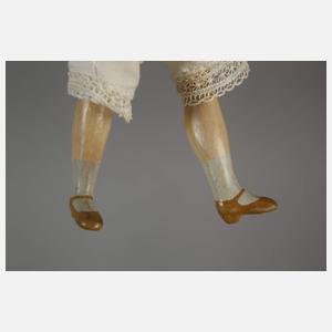 Kleine Porzellankopfpuppe