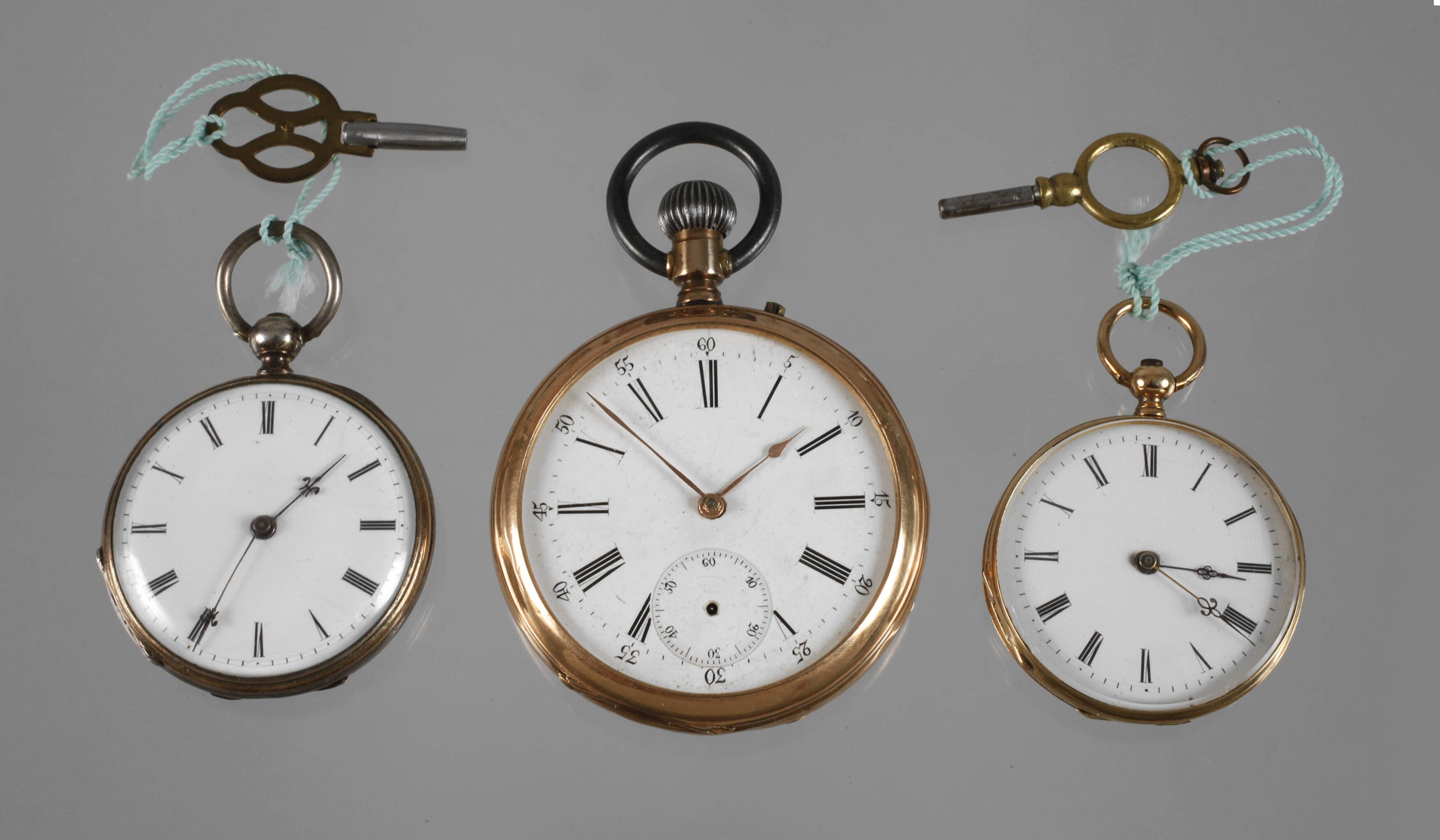 Drei Taschenuhren