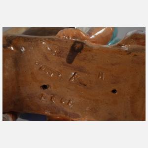 Kinderpaar mit Buch und Teddy