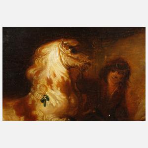 Stallknecht mit Pferd