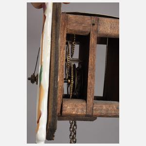 Vier kleine Porzellanschilderuhren