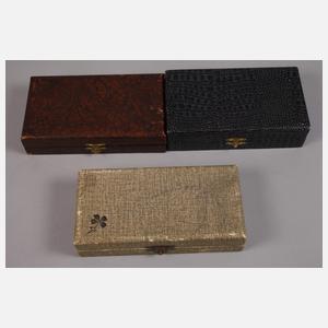 Drei Sets Dessertbesteck