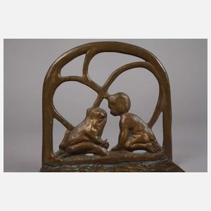 Buchstützen mit Kind und Fröschen