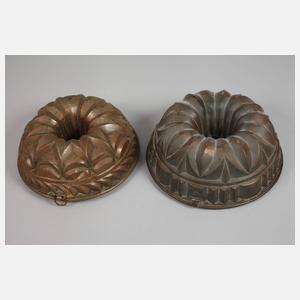 Fünf Kupferbackformen