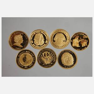 Sieben Münzen Gold 999