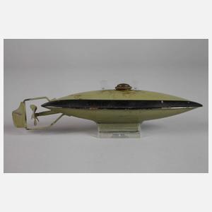 Mechanisches Blechspielzeug als U-Boot und Hase