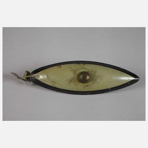 Mechanisches Blechspielzeug als U-Boot und Hase