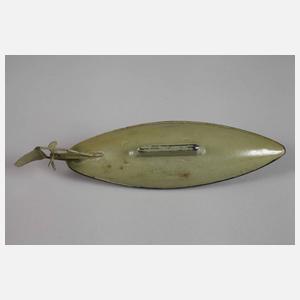 Mechanisches Blechspielzeug als U-Boot und Hase