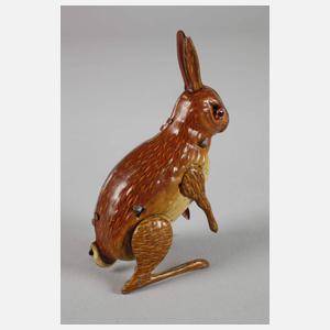 Mechanisches Blechspielzeug als U-Boot und Hase