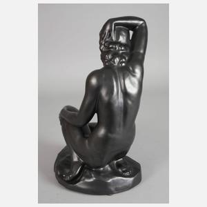 Hockender weiblicher Akt