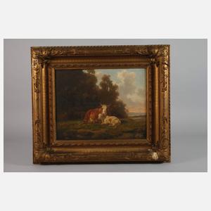 Kühe und Ziegen vor Dorfkulisse