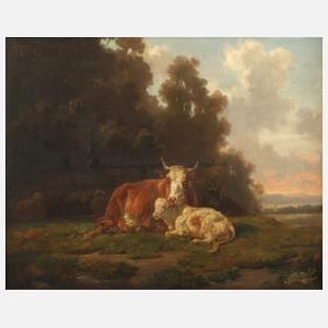 Kühe und Ziegen vor Dorfkulisse