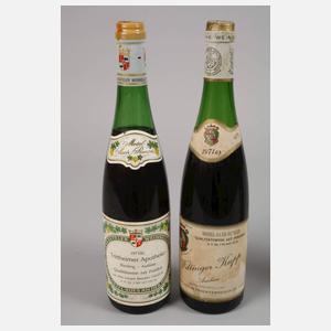 Vier Flaschen Weißwein