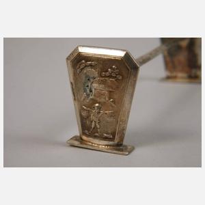 Zwölf Messerbänkchen