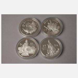 Vier Silbermünzen China