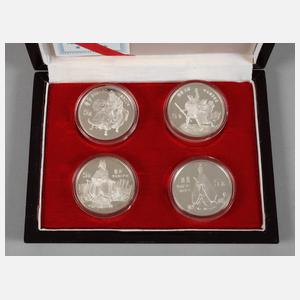 Vier Silbermünzen China