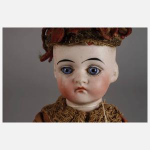 Puppen-Halbautomat als Nachziehspielzeug