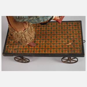 Puppen-Halbautomat als Nachziehspielzeug